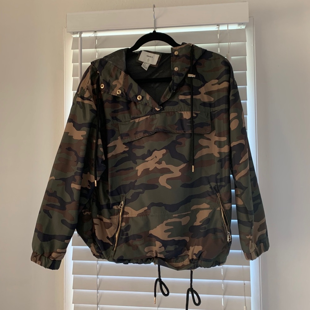 Camouflage windbreaker jacket with gold accents
